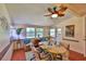 Eat-in dining area featuring ceiling fan, natural light, and a dining table with seating for four at 1500 Robinson N Dr, St Petersburg, FL 33710