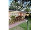 Quaint single-story home with a well-kept lawn and inviting front entryway at 1500 Robinson N Dr, St Petersburg, FL 33710