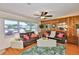 Inviting living room with comfortable seating, warm wood accents, and plenty of natural light at 1500 Robinson N Dr, St Petersburg, FL 33710