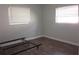 Empty bedroom with hardwood flooring and natural light, offering a blank canvas for personalization at 162 Sw Lincoln N Cir, St Petersburg, FL 33703