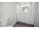 Modern bathroom with double vanity, undermount sinks, and clean, neutral color palette at 1768 Lago Vista Blvd, Palm Harbor, FL 34685