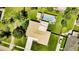Aerial of home with fenced backyard, pool, screened in porch and long driveway at 1829 1St E Ave, Bradenton, FL 34208