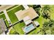 Aerial view of the home with a pool and fenced-in backyard at 1829 1St E Ave, Bradenton, FL 34208