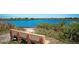 Scenic park view with bench seating beside a tranquil body of water at 1829 1St E Ave, Bradenton, FL 34208