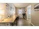 Bright hallway with tiled floors, desk, and natural light at 1829 1St E Ave, Bradenton, FL 34208