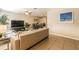 Bright living room featuring tile floors, neutral walls and ceiling fan at 1829 1St E Ave, Bradenton, FL 34208