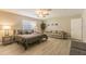 Spacious main bedroom with ceiling fan and good natural lighting at 1829 1St E Ave, Bradenton, FL 34208