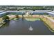 Aerial view of condo complex with pond and fountain at 1900 58Th N Ave # 26, St Petersburg, FL 33714