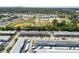 Aerial view showcasing the community's expansive layout, sports fields, and lush greenery at 1900 58Th N Ave # 26, St Petersburg, FL 33714