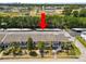 Aerial view of home featuring nearby garages and mature trees at 1900 58Th N Ave # 26, St Petersburg, FL 33714
