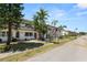 Exterior of home featuring palm trees and lush landscaping at 1900 58Th N Ave # 26, St Petersburg, FL 33714