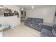 Inviting living area with furniture, decor, and an adjacent dining space at 1900 58Th N Ave # 26, St Petersburg, FL 33714