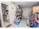 Living room area featuring storage and access to kitchen at 1900 58Th N Ave # 26, St Petersburg, FL 33714