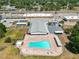 Aerial view of a community pool featuring lounge chairs and a geometric design at 1900 58Th N Ave # 26, St Petersburg, FL 33714
