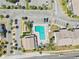 Aerial view of the pool area with ample parking and lush landscaping at 1981 Lakewood Club S Dr # 4M, St Petersburg, FL 33712