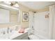 Cozy bathroom featuring a shower and tub combination, and a coordinated color scheme at 1981 Lakewood Club S Dr # 4M, St Petersburg, FL 33712