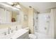 Bathroom featuring shower and tub combination, updated vanity with white sink at 1981 Lakewood Club S Dr # 4M, St Petersburg, FL 33712