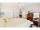 Bedroom with a large closet, ceiling fan, and comfortable bed at 1981 Lakewood Club S Dr # 4M, St Petersburg, FL 33712