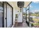 Relaxing patio overlooks a serene pond and is perfect for outdoor enjoyment at 1981 Lakewood Club S Dr # 4M, St Petersburg, FL 33712