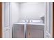 Bright laundry room featuring a washer and dryer set at 1984 Hawks View Dr, Ruskin, FL 33570