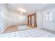 Bright living room featuring hardwood floors, natural light, and a view of the home's entrance at 2117 Laindale Pl, Valrico, FL 33596