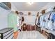 Walk-in closet with shelving, hanging racks and carpet flooring at 2117 Laindale Pl, Valrico, FL 33596