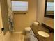 Neutral bathroom with granite countertop vanity and shower-tub combination at 2213 Towering Oaks Cir, Seffner, FL 33584