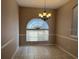 Dining room featuring natural light, neutral walls, and tiled flooring at 2213 Towering Oaks Cir, Seffner, FL 33584