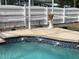 Pool area with fountain features at 2213 Towering Oaks Cir, Seffner, FL 33584