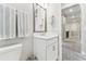 Bathroom with a bright white vanity and a single sink with modern fixtures at 29895 Picana Ln, Wesley Chapel, FL 33543