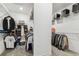 Spacious walk-in closet with wire shelving and ample space for clothing and storage at 29895 Picana Ln, Wesley Chapel, FL 33543