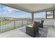Enjoy this inviting outdoor patio with comfortable seating and scenic water views at 29895 Picana Ln, Wesley Chapel, FL 33543