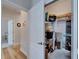 Walk-in closet featuring shelving, ample storage space, and easy access from the hallway at 3603 Woodmont Dr, Parrish, FL 34219