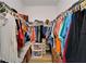 Walk-in closet with double-hung rods and storage to maximize space at 3603 Woodmont Dr, Parrish, FL 34219