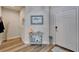 Inviting entryway featuring wood floors, stylish decor, and a bright, welcoming atmosphere for guests at 3603 Woodmont Dr, Parrish, FL 34219