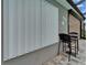 Exterior home view of accordion hurricane shutters and view of the patio area at 3603 Woodmont Dr, Parrish, FL 34219