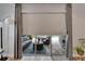 View through sliding glass doors to screened in lanai and pool area at 3603 Woodmont Dr, Parrish, FL 34219