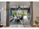 Screened in porch featuring comfortable seating and a view of the swimming pool at 3603 Woodmont Dr, Parrish, FL 34219