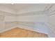 A large walk-in closet with custom shelving, perfect for organization and ample storage space at 3614 W Platt St, Tampa, FL 33609