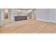 Modern kitchen featuring a center island with seating, sleek countertops, and stainless steel appliances at 3616 W Platt St, Tampa, FL 33609