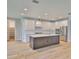 Stylish kitchen boasting an island, stainless steel appliances, and ample cabinet space for storage at 3616 W Platt St, Tampa, FL 33609
