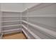 Walk-in pantry with shelving perfect for organization and storage at 3616 W Platt St, Tampa, FL 33609