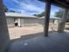 View of the backyard under construction, showing a building, patio, and ready for landscaping at 406 N Westland St # 1, Tampa, FL 33609