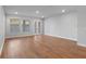 Open living room area with hardwood floors and natural light, perfect for relaxation and entertainment at 406 N Westland St # 1, Tampa, FL 33609
