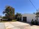 Exterior view of a well maintained home with a two car garage and driveway at 4322 Baden Dr, Holiday, FL 34691