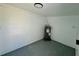 Bare storage room with grey painted concrete floors and block walls at 4322 Baden Dr, Holiday, FL 34691
