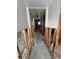 Hallway showing studs, ready for customization, connecting different areas of the home at 4580 Overlook Ne Dr # 189, St Petersburg, FL 33703
