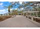 Community recreation area with sitting benches and pergola at 4690 Wrentham Pl, Palm Harbor, FL 34685