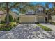 Charming two-story home featuring a well-maintained lawn and a convenient two-car garage at 4815 Barnstead Dr, Riverview, FL 33578