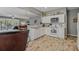 Bright kitchen featuring white cabinetry and appliances, offering a clean, modern feel at 4815 Barnstead Dr, Riverview, FL 33578